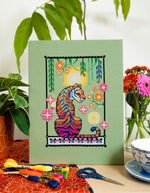 Art Nouveau Tiger cross stitch pattern by NeedleLot Designs, a tiger in an Art Nouveau frame