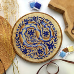 Pretty Python cross stitch pattern by NeedleLot Designs, a python in blue tones