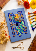 Art Nouveau Peacock cross stitch pattern by NeedleLot Designs, a peacock in an Art Nouveau frame