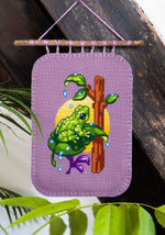 Mossy Frog cross stitch pattern by NeedleLot Designs, a mossy frog with raindrops