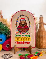 Have A Very Beary Christmas cross stitch pattern by NeedleLot Designs, a bear celebrating Christmas