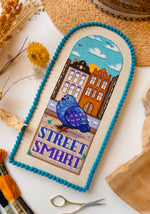 Street Smart Pigeon cross stitch pattern by NeedleLot Designs, a city pigeon
