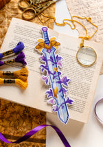 Lost Flower Blade cross stitch pattern by NeedleLot Designs, a sword bookmark with flowers