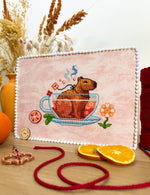 Capybara Tea Time cross stitch pattern by NeedleLot Designs, a capybara in a hot bath