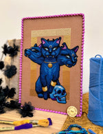 Cerberpuss cross stitch pattern by NeedleLot Designs, a three-headed cat