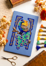Art Nouveau Peacock cross stitch pattern by NeedleLot Designs, a peacock in an Art Nouveau frame