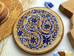 Pretty Python cross stitch pattern by NeedleLot Designs, a python in blue tones