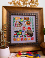 Forest Halloween cross stitch pattern by NeedleLot Designs, woodland animals at a Halloween party
