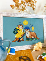 Fishing Buddies cross stitch pattern by NeedleLot Designs, two otters fishing