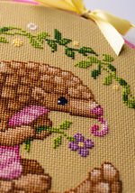 Pangolin cross stitch pattern by NeedleLot Designs, a pangolin