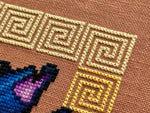 Cerberpuss cross stitch pattern by NeedleLot Designs, a three-headed cat