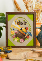 I Dig It Mole cross stitch pattern by NeedleLot Designs, a mole in a garden