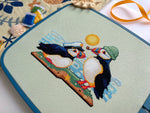 Puffins cross stitch pattern by NeedleLot Designs, puffins with fish