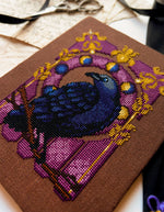 Art Nouveau Crow cross stitch pattern by NeedleLot Designs, a crow in an Art Nouveau frame