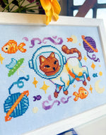 Catstronaut cross stitch pattern by NeedleLot Designs, a cat in a space suit