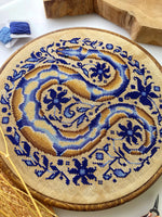 Pretty Python cross stitch pattern by NeedleLot Designs, a python in blue tones