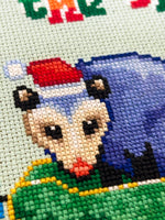 Trashing Through The Snow cross stitch pattern by NeedleLot Designs, raccoons in a sleigh in the snow
