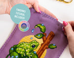 Mossy Frog cross stitch pattern by NeedleLot Designs, a mossy frog with raindrops