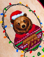 Have A Very Beary Christmas cross stitch pattern by NeedleLot Designs, a bear celebrating Christmas