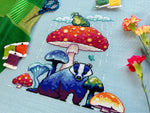 Mushroom Badger cross stitch pattern by NeedleLot Designs, a badger under a toadstool