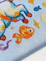 Catstronaut cross stitch pattern by NeedleLot Designs, a cat in a space suit
