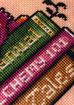 Book Dragon cross stitch pattern by NeedleLot Designs, a dragon with books