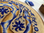 Pretty Python cross stitch pattern by NeedleLot Designs, a python in blue tones