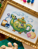 Tea Dragon cross stitch pattern by NeedleLot Designs, a teapot dragon