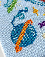 Catstronaut cross stitch pattern by NeedleLot Designs, a cat in a space suit