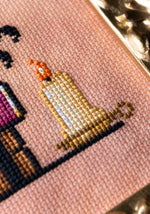 Book Dragon cross stitch pattern by NeedleLot Designs, a dragon with books