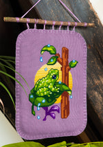 Mossy Frog cross stitch pattern by NeedleLot Designs, a mossy frog with raindrops